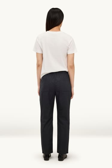 Femmes - Pantalon en toile - mid waist - tapered fit - noir