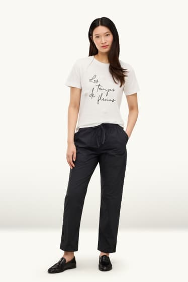 Femmes - Pantalon en toile - mid waist - tapered fit - noir