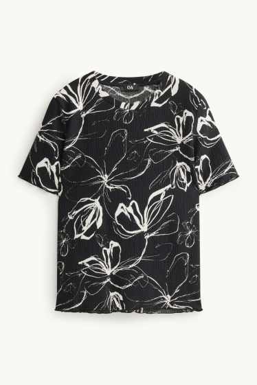 Dames - T-shirt - regular fit - gebloemd - zwart / wit