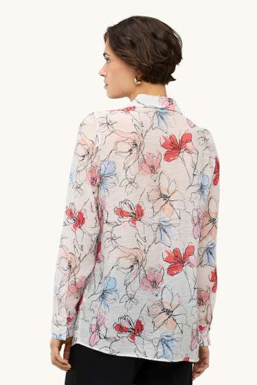 Dona - Brusa - de flors - blanc