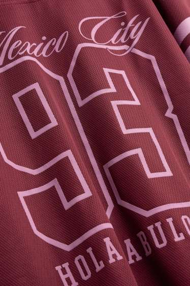 Kinder Mädchen - Kurzarmshirt mit V-Ausschnitt - Oversized - rosa / dunkelrot