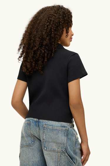 Nena - Polo - acanalat - negre