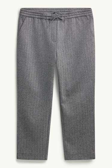 Dámské - Žerzejové kalhoty - mid waist - tapered fit - se vzorem - šedá-žíhaná