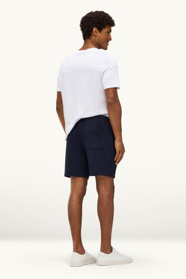 Hommes - Short en molleton - finition texturée - bleu foncé