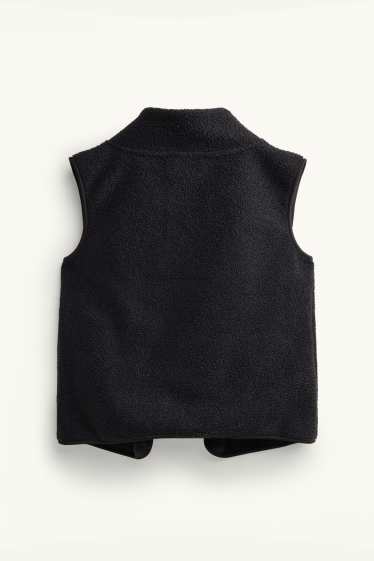 Dames - Zwangerschapsvest van fleece - met babydraagzak - zwart