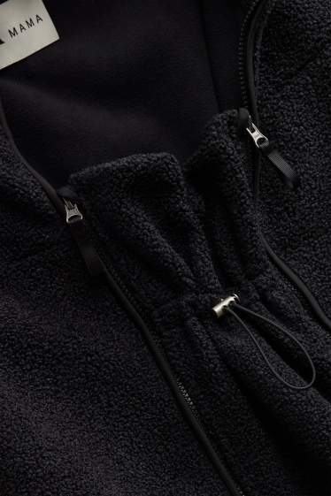 Dames - Zwangerschapsvest van fleece - met babydraagzak - zwart