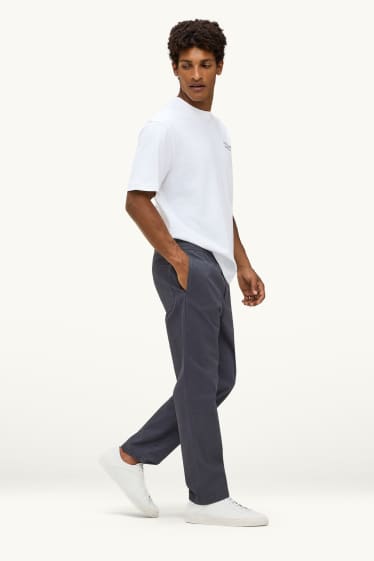 Home - Xinos - relaxed fit - gris fosc