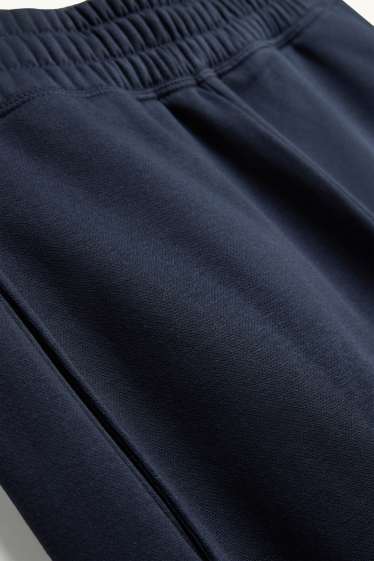 Dona - Pantalons de xandall - blau fosc
