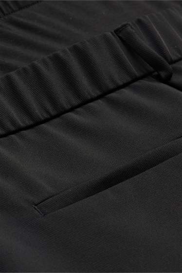 Femmes - Pantalon de grossesse - jambes larges - noir