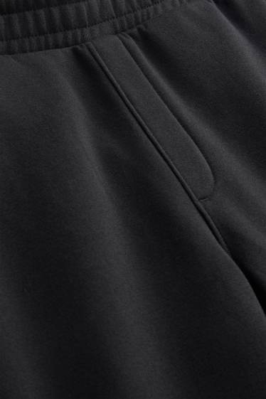 Hommes - Pantalon de jogging - noir