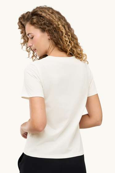 Dona - Samarreta de mànigues curtes amb perles - regular fit - blanc/negre