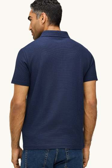 Uomo - Polo - regular fit - tessuto tramato - blu scuro