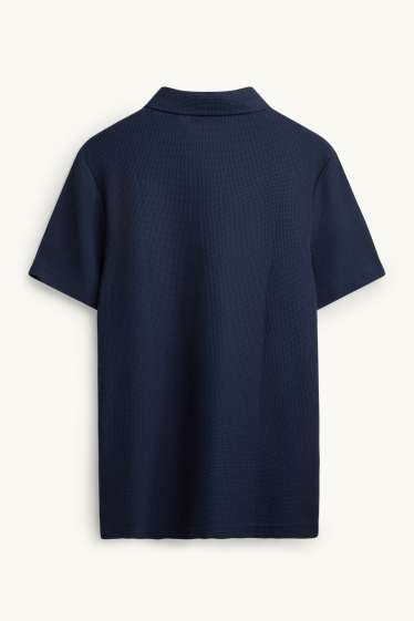 Uomo - Polo - regular fit - tessuto tramato - blu scuro
