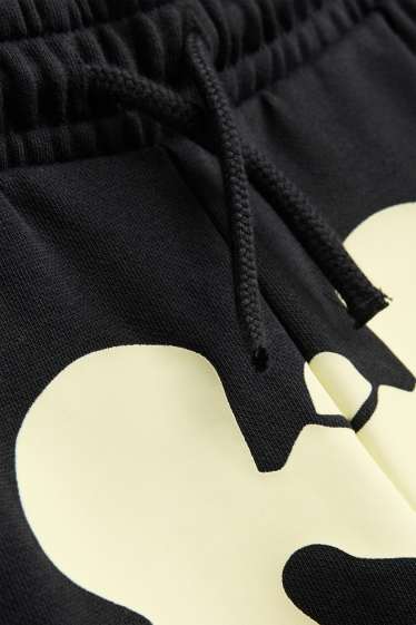 Nen - Halloween - esquelet - pantalons de xandall - brilla en la foscor - negre