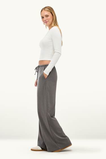Dona - Pantalons de tela - mid waist - wide leg - gris