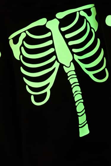 Nen - Halloween - esquelet - dessuadora amb caputxa - brilla en la foscor - negre/blanc