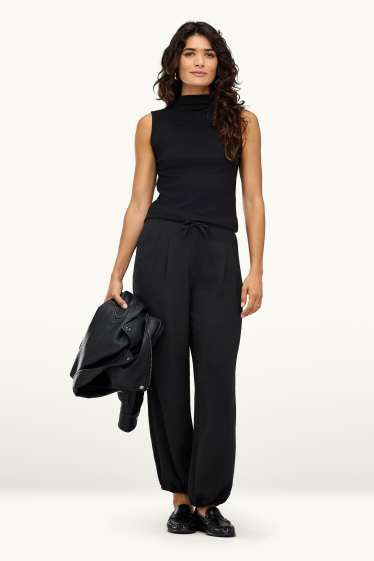 Women - Harem trousers - mid-rise waist - balloon leg - black