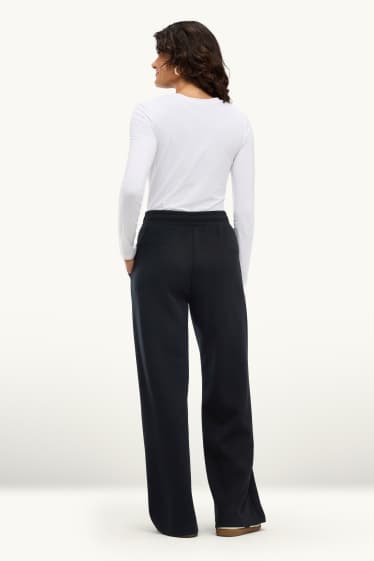 Dona - Pantalons de xandall - negre
