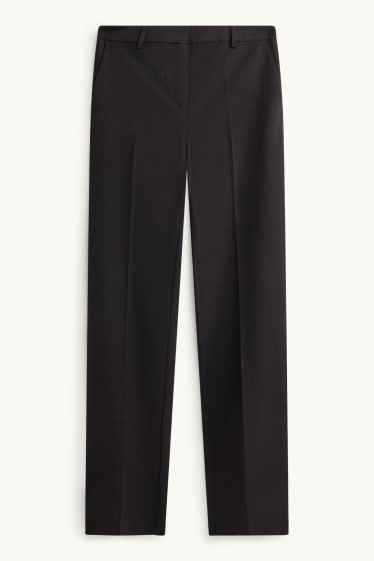 Dona - Pantalons de tela - mid waist - acampanats - negre