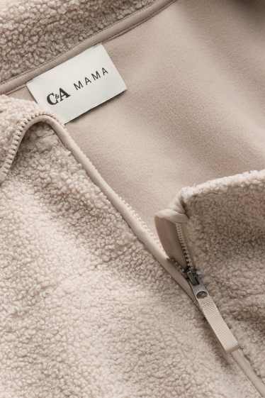 Dames - Zwangerschapsvest van fleece - met babydraagzak - licht beige