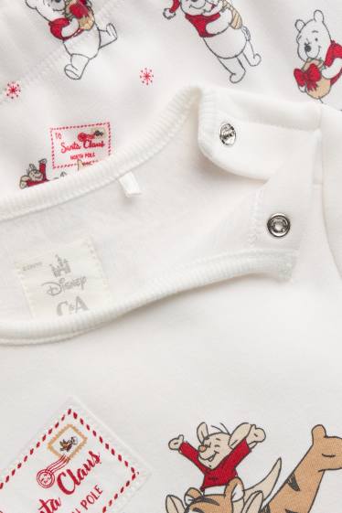 Unisex - Winnie de Poeh - babypyjama - gevoerd met pluche - 2-delig - wit / rood