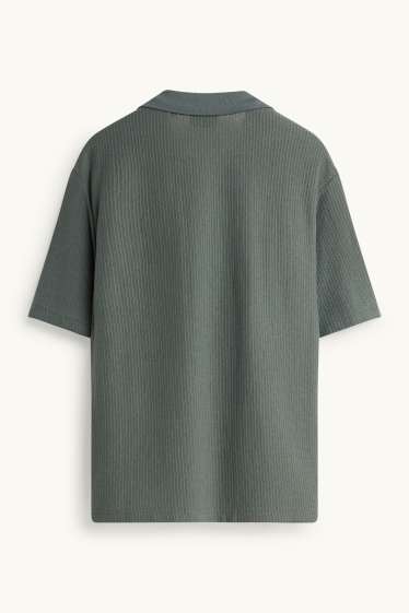 Heren - Gebreid poloshirt - relaxed fit - met structuur - groen