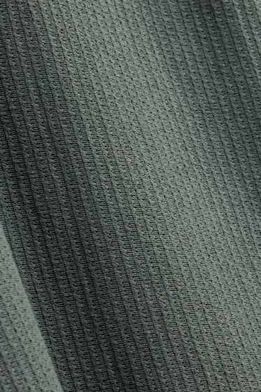 Heren - Gebreid poloshirt - relaxed fit - met structuur - groen