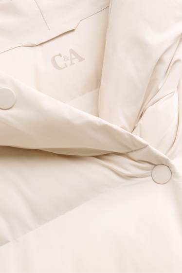 Dona - Abric embuatat amb caputxa - repel·lent a l’aigua - crema