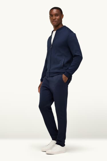 Uomo - Pantaloni sportivi - nero