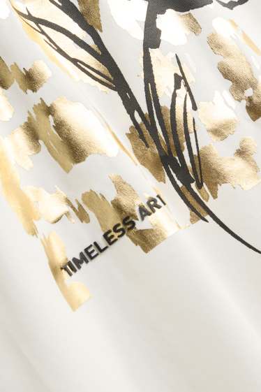 Dames - Longsleeve - regular fit - glanseffect - wit / goud