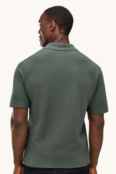 Heren - Gebreid poloshirt - relaxed fit - met structuur - groen