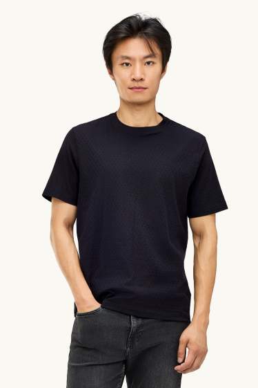 Uomo - T-shirt - regular fit - tessuto tramato - nero