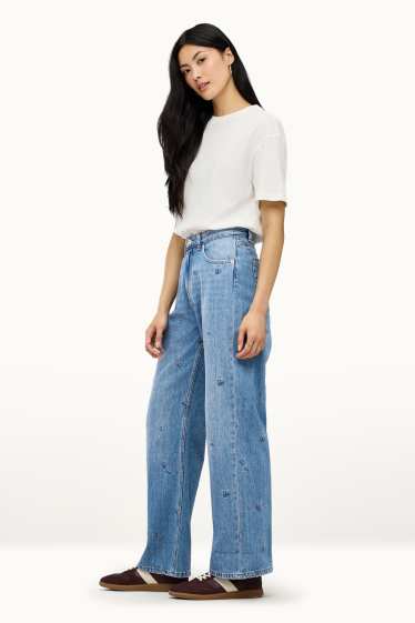 Women - Baggy jeans - mid-rise waist - floral - blue denim
