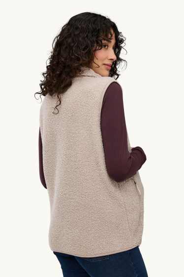 Dames - Zwangerschapsvest van fleece - met babydraagzak - licht beige