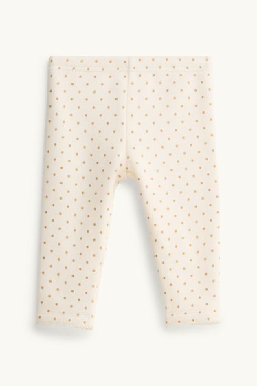 Baby: meisjes - Babylegging - gevoerd met pluche - gestippeld - crèmekleurig