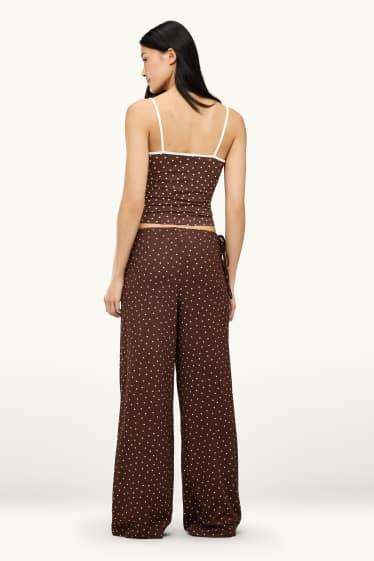 Dona - Pantalons de tela - mid waist - palazzo - de piquets - marró / blanc trencat