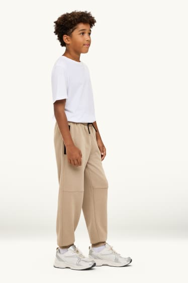 Kinder Buben - Jogginghose - schwarz / beige