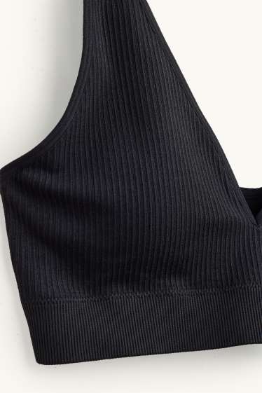 Femmes - Brassière - ampliforme - finition côtelée - seamless - noir