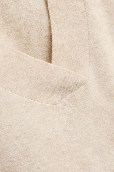 Femmes - Pull avec encolure en V - beige chiné