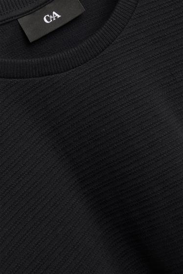 Home - Samarreta de mànigues curtes de punt - regular fit - texturada - negre