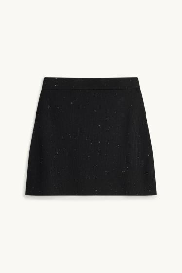Femei - Fustă mini - reiată - aspect lucios - negru