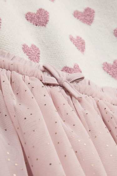 Baby: meisjes - Hartje - baby-outfit - 2-delig - glanseffect - wit / fuchsiarood