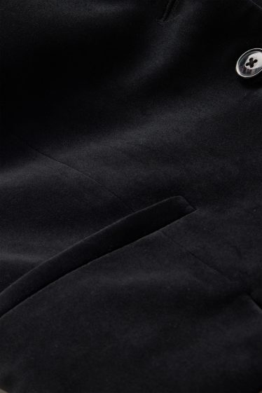 Femmes - Gilet sans manches de bureau en velours - finition cintrée - noir