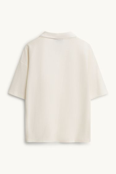 Hommes - Polo en maille - Oversize - finition texturée - blanc crème