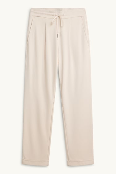 Dona - Pantalons de tela - mid waist - tapered fit - crema