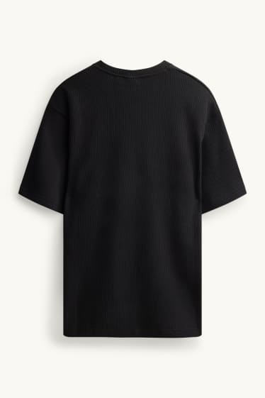Mężczyźni - T-shirt - relaxed fit - w prążki - czarny
