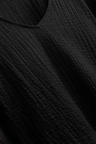 Damen - T-Shirt mit V-Ausschnitt - Regular Fit - schwarz