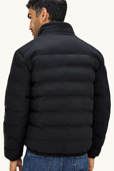 Home - Jaqueta embuatada tècnica - amb folre - impermeable - negre