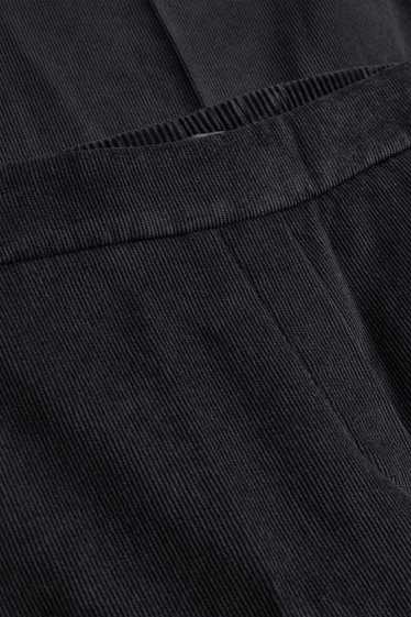 Donna - Pantaloni in velluto a coste - vita media - gamba ampia - nero