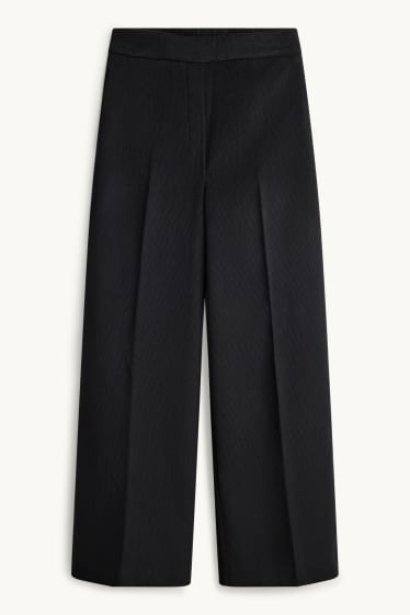 Donna - Pantaloni in velluto a coste - vita media - gamba ampia - nero